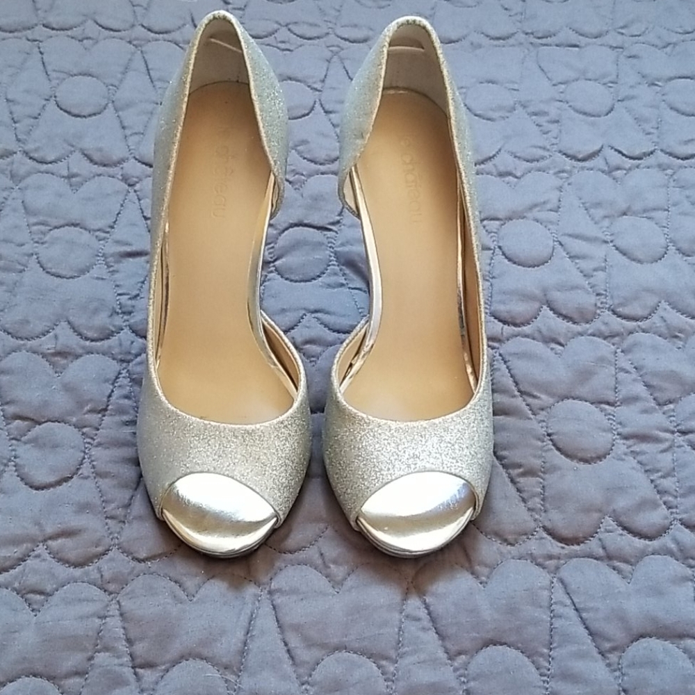 Sparkly le Chateau peeptoe pumps.